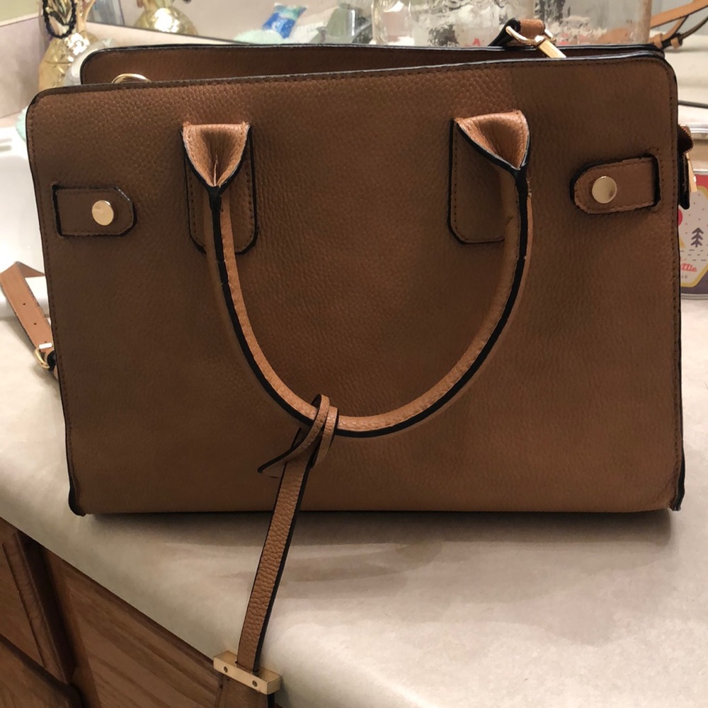 Tan handbag with long strap